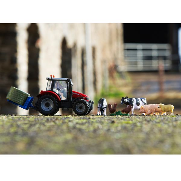 Набір "Модель трактора Massey Ferguson 5612 з вилами та фігурками 1:32" 43205 фото